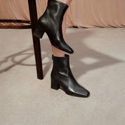 Black Waxy Leather Ankle Heeled Boots