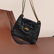 Black ST Twist Lock Chain Envolpe Crossbody Bags