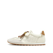 Perforated ST Logo Suede Patchwork Flat Sneakers