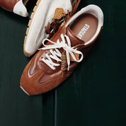 Perforated ST Logo Suede Patchwork Flat Sneakers
